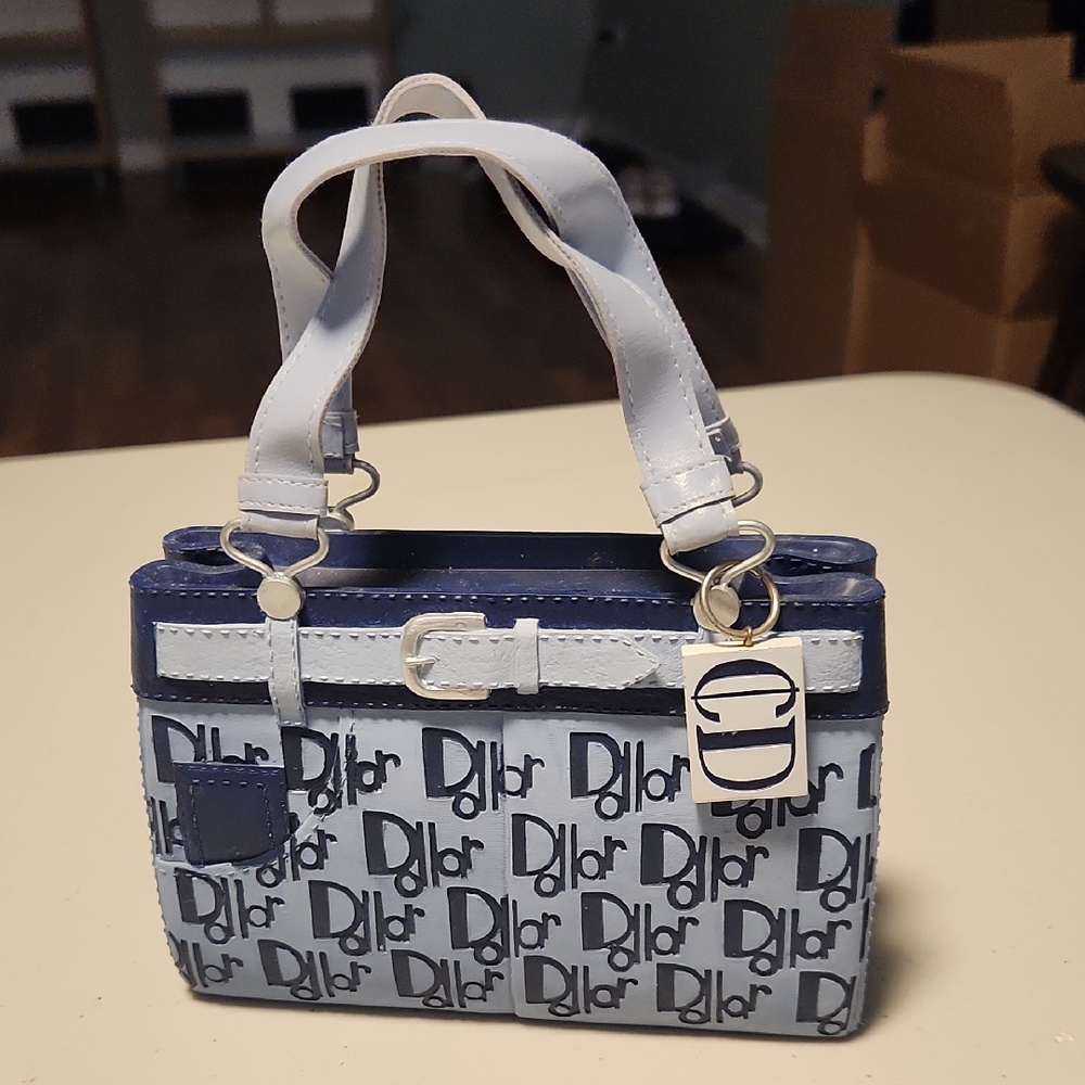 Fun, stylish, designer bag-shaped piggy bank